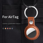 غطاء حماية من الجلد مقاوم للصدمات والخدوش مع حلقة تعليق وسلسلة مفاتيح لجهاز AirTag الجيل الثاني / الجيل الأول