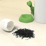 Silikon-Teesieb „Dinosaurier Baby“, Glücksgrün, Kerzenlichtgelb